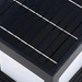 Close-up of a solar panel with black surface and white frame