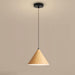 Wooden pendant light against a beige background