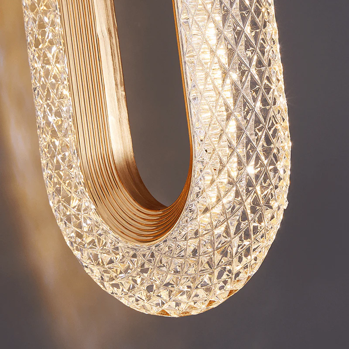 Decorative light fixture with crystal-like texture on a dark background