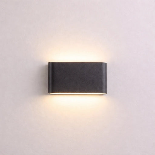 Black Lightstone Up / Down Wall Lamp | Black wall-mounted light fixture from Creative Living
