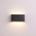 Black Lightstone Up / Down Wall Lamp | Black wall-mounted light fixture from Creative Living