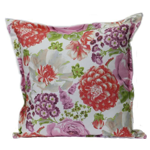 Floral patterned pillow with pink, red, and purple flowers on a white background