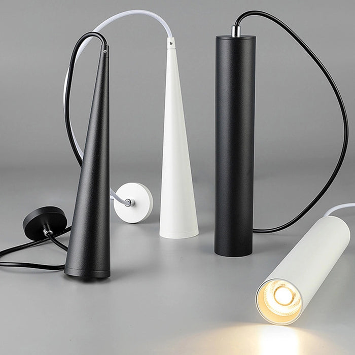 Modern black and white pendant lights on a gray background