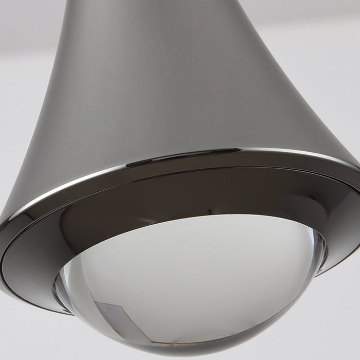 Close-up of a modern ceiling light fixture with a gray shade on a white background