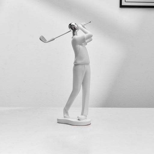 White sculpture of a golfer on a white background