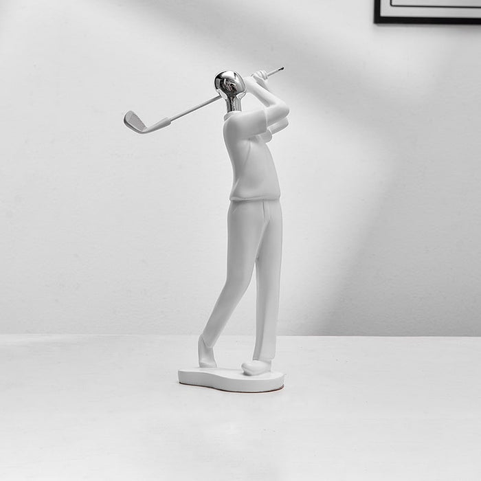 White sculpture of a golfer on a white background