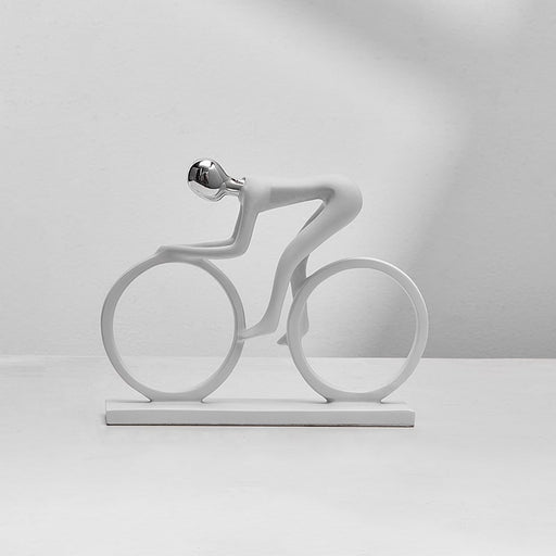 White bicycle-shaped decorative object on a gray background