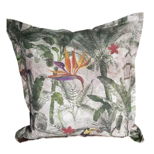Decorative pillow with tropical leaf and flower pattern on a white background